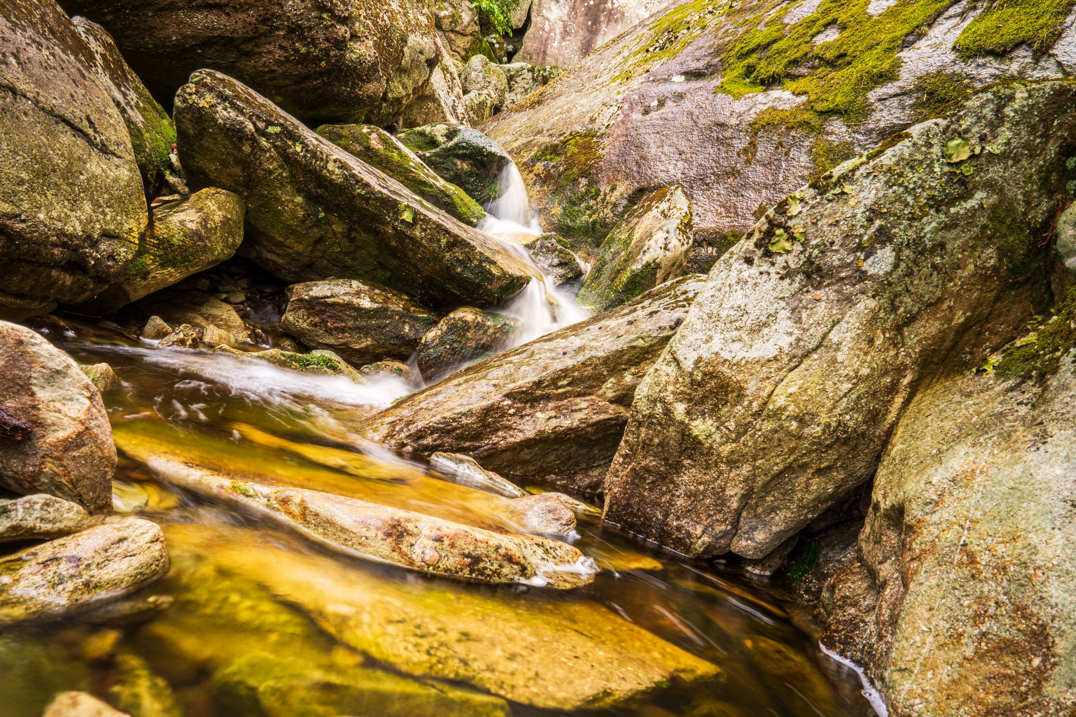 Clear mountain stream over rocks